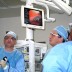 Dr. Raphael Bueno, left, and team use a new MIT technology to shrink a patient's lung tumor by more than 90 percent during laser surgery at Brigham and Women's Hospital. Photo / Yoel Fink