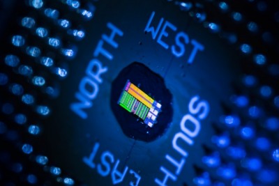 Researchers have produced a working optoelectronic chip that computes electronically but uses light to move information. The chip has 850 optical components and 70 million transistors, which, while significantly less than the billion-odd transistors of a typical microprocessor, is enough to demonstrate all the functionality that a commercial optical chip would require. Image: Glenn J. Asakawa